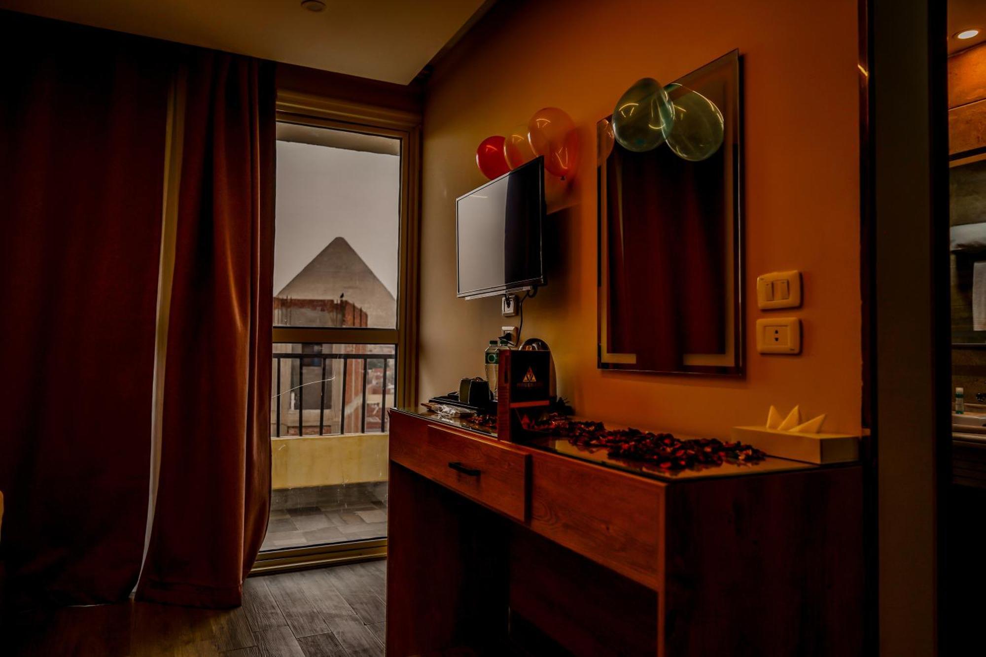 Pyramids Hotel Kafret el-Gabal Exterior foto