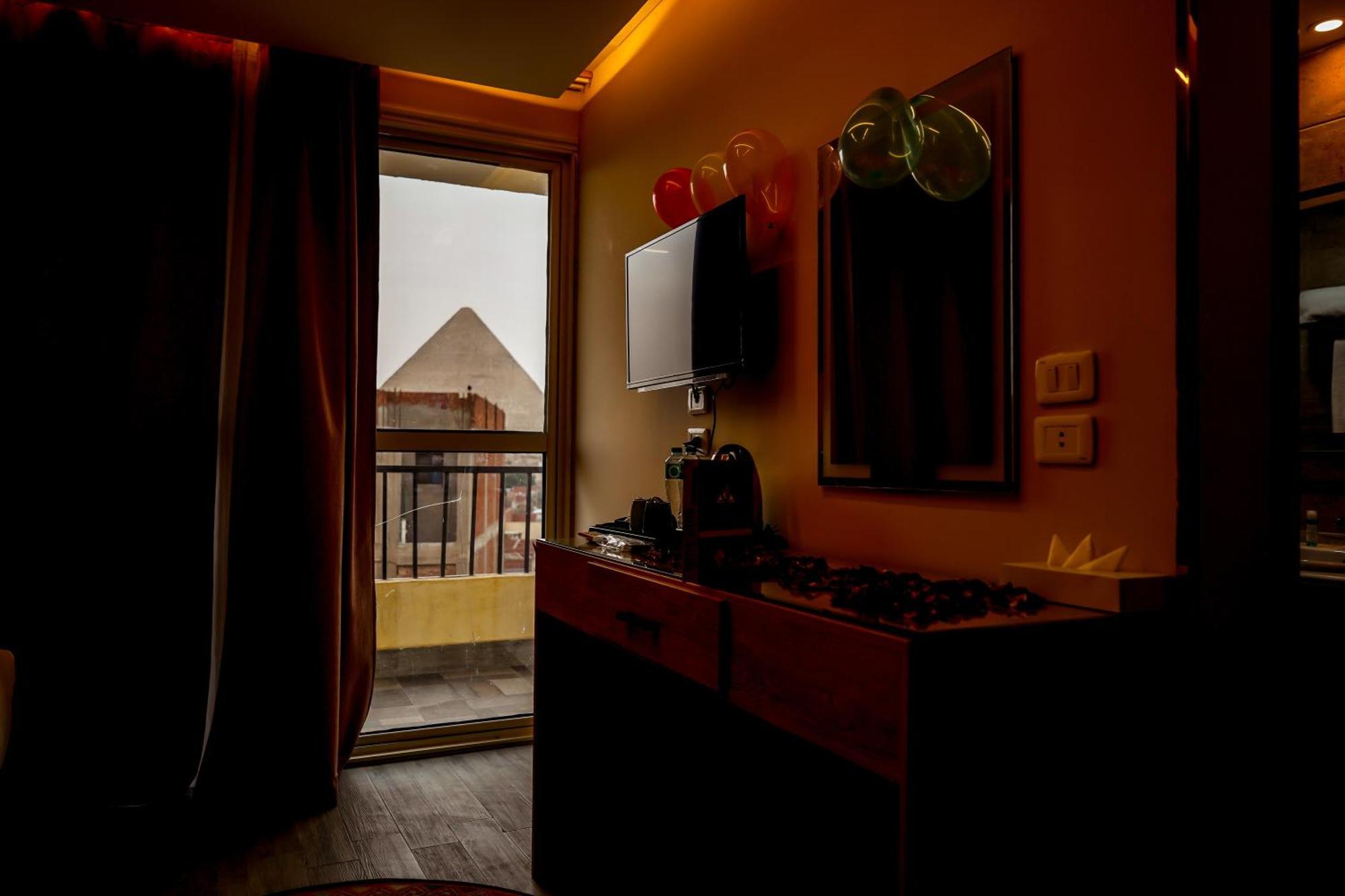 Pyramids Hotel Kafret el-Gabal Exterior foto